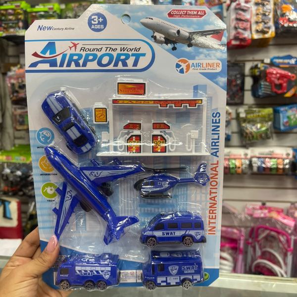 Set aeropuerto con avión y vehículos azul