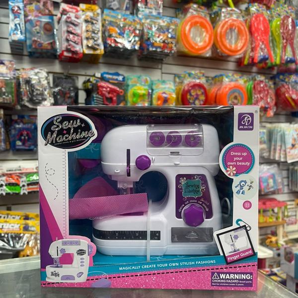 Máquina de coser de juguete con luz