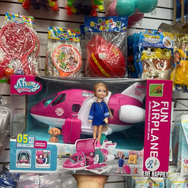 Avión de juguete con muñeca