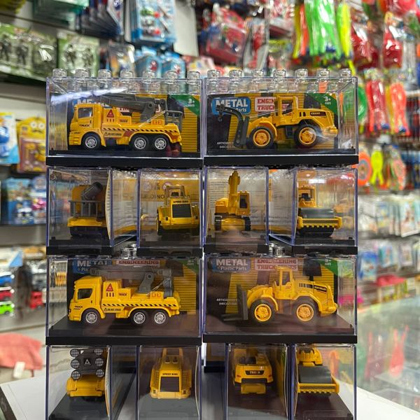 Exhibidor de vehículos de construcción a escala